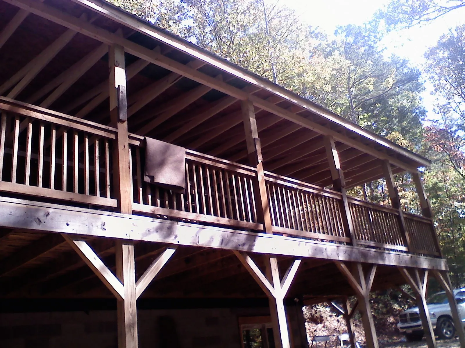 Timber framing under a new elevated porch and deck — Roof Leak Repair in Hopkins by Roofing Brothers